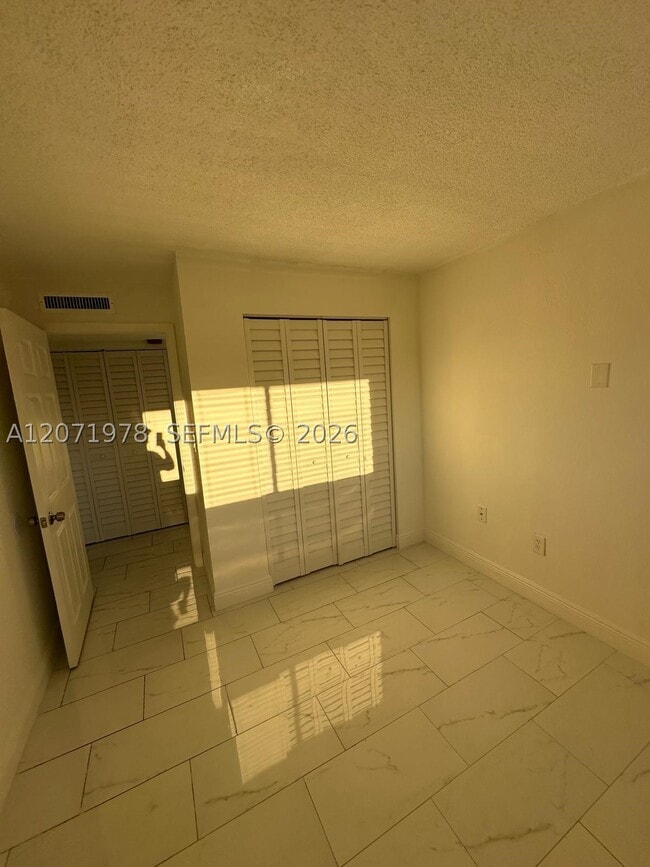 Building Photo - 7401 SW 152nd Ave