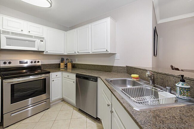 Building Photo - 7455 Charmant Dr