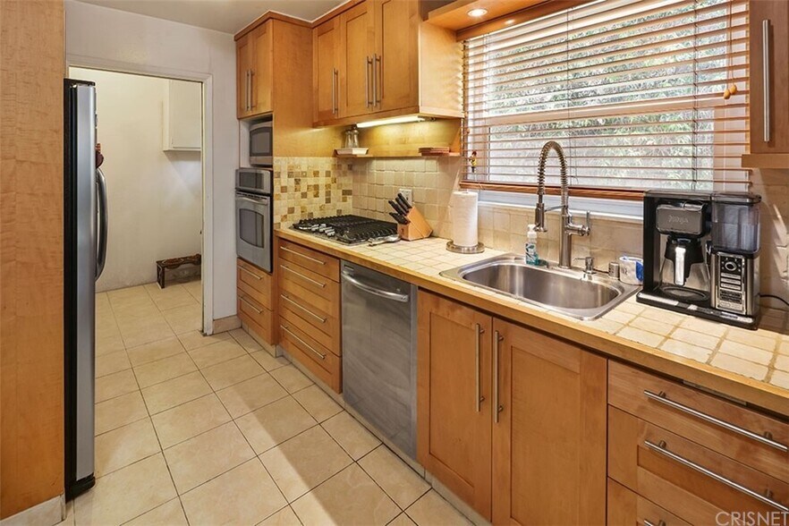 KItchen, Wash and Dryer Room View - 6565 Vicky Ave