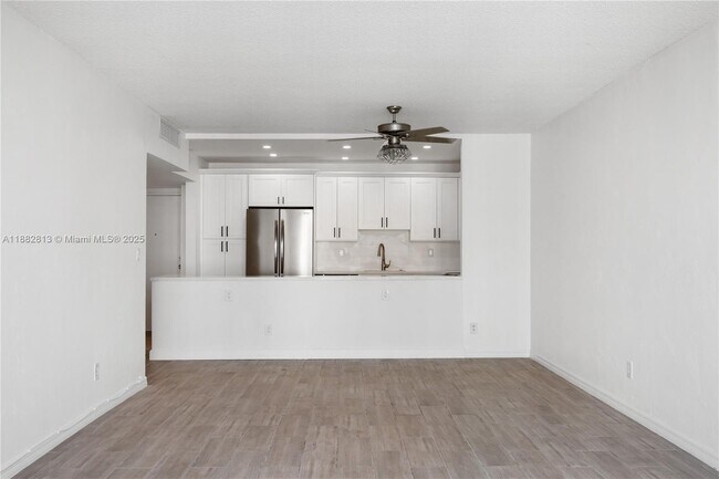 Building Photo - 19380 Collins Ave