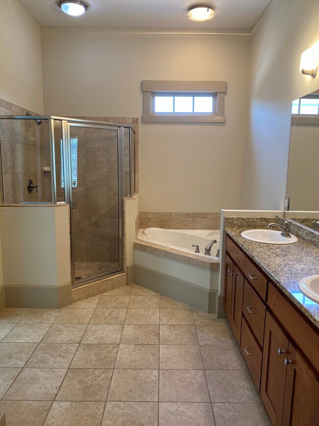 Master bath with stall shower, jetted soaking tub, and double vanity - 125 Tribble Gap Rd