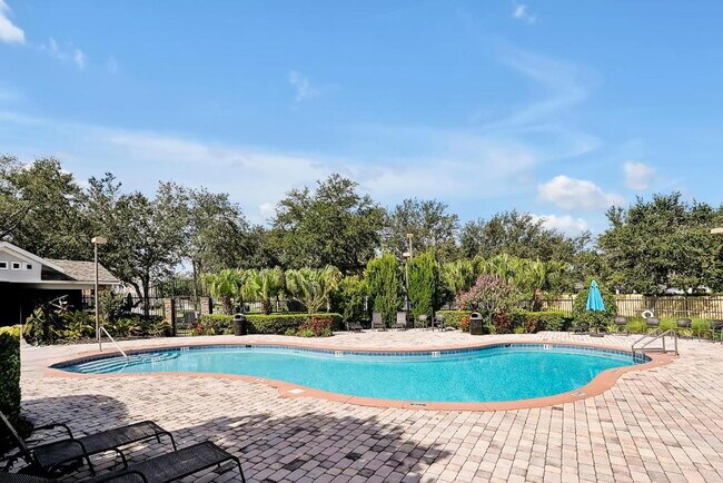Building Photo - "Stunning 3BR Orlando Home with Private Screened Pool, Spa & Spacious Living Areas"