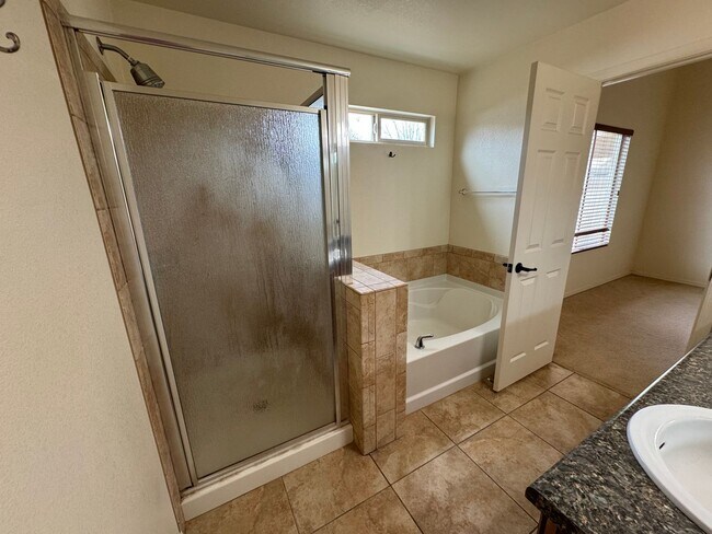 Building Photo - 4BR/2BA/2CG, TESLA CHARGER 1765 sq.ft. ren...