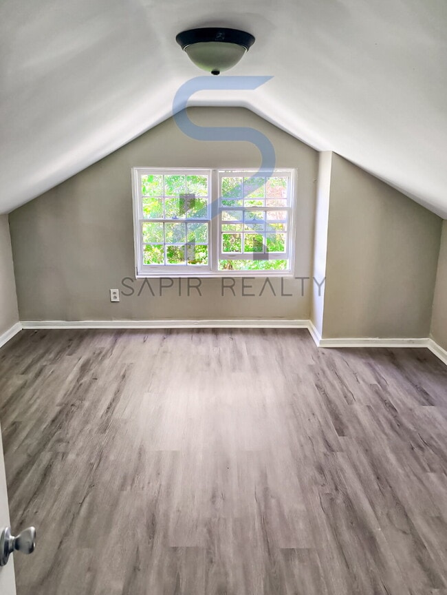 Building Photo - Move in before December 15th and choose your reward: a $250 Amazon Gift Card or a 55" Smart TV!