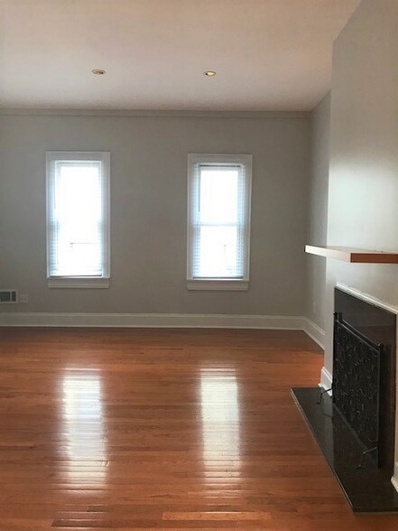 Apartment door entrance into Spacious Living Room - 5934 Elwood St