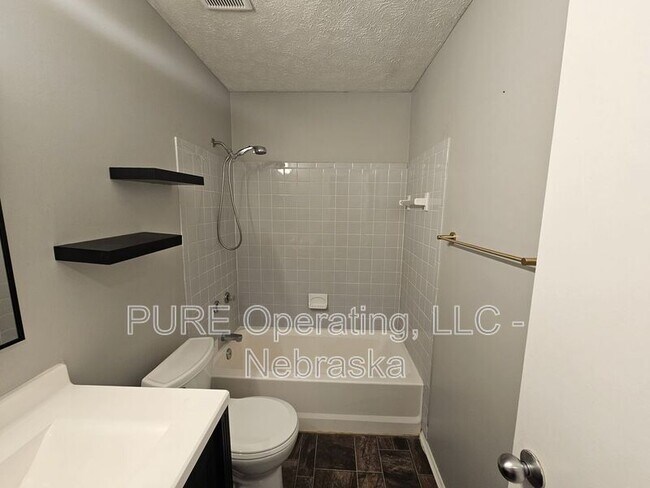 Building Photo - 8303 Vernon Ave