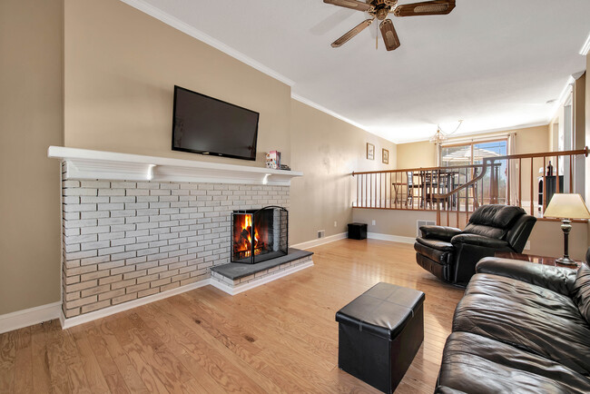 Living room with working fireplace - 1500 Cambridge Dr