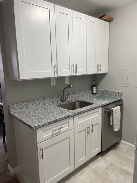 New kitchen with stainless steel appliances - 2030 F St NW