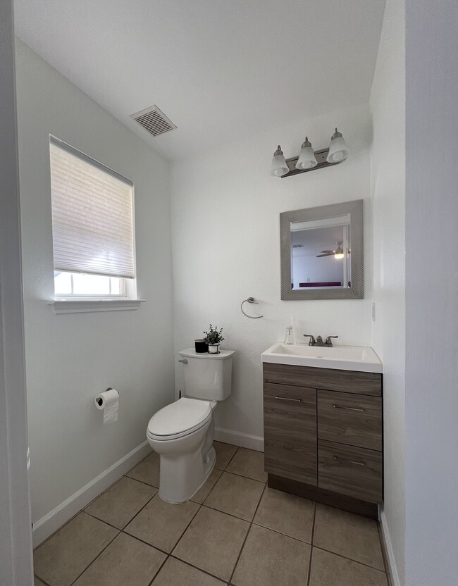 1st floor half bathroom - 11908 Lima Dr