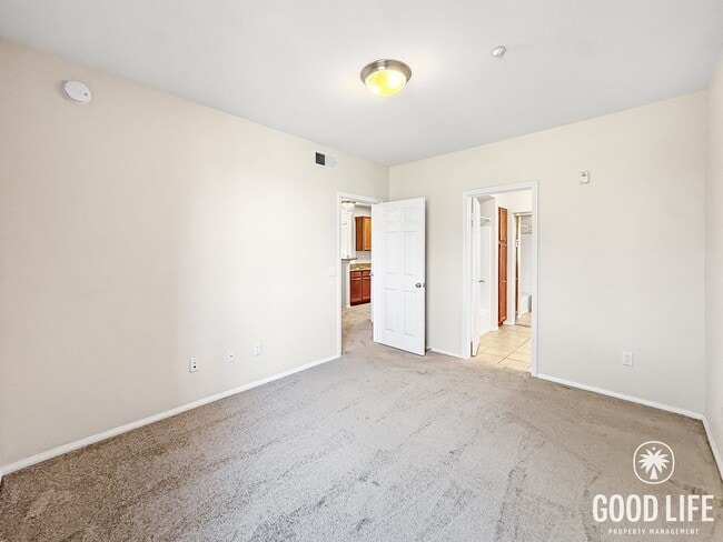 Building Photo - Bright 2BR/2BA Condo with Balcony, Garage & Resort-Style Amenities in Carmel Valley!