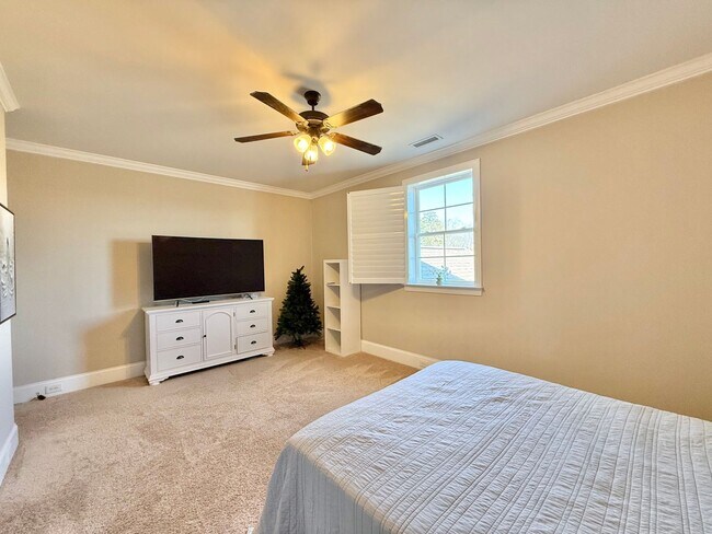 Building Photo - Luxurious 3BD, 4BA Raleigh Townhome with a Bonus Sunroom, Jacuzzi, and Large Upstairs Loft within...