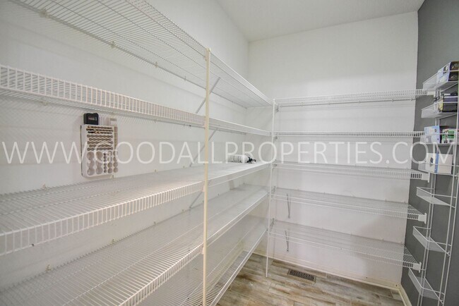 Building Photo - 4 Bedroom 4 Bath Executive Home in West Des Moines with a fenced in yard and a 3-car garage