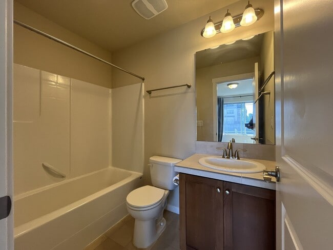Building Photo - Spacious Bull Mountain Townhome Featuring Two Ensuite Bedrooms, Attached Garage & Modern Finishes &