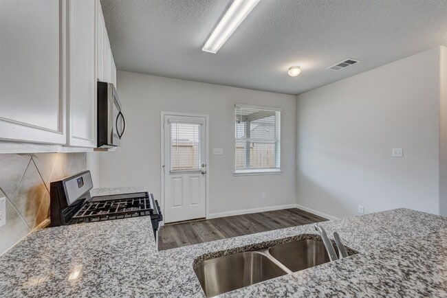 Building Photo - 5011 Blue Jacaranda Wy