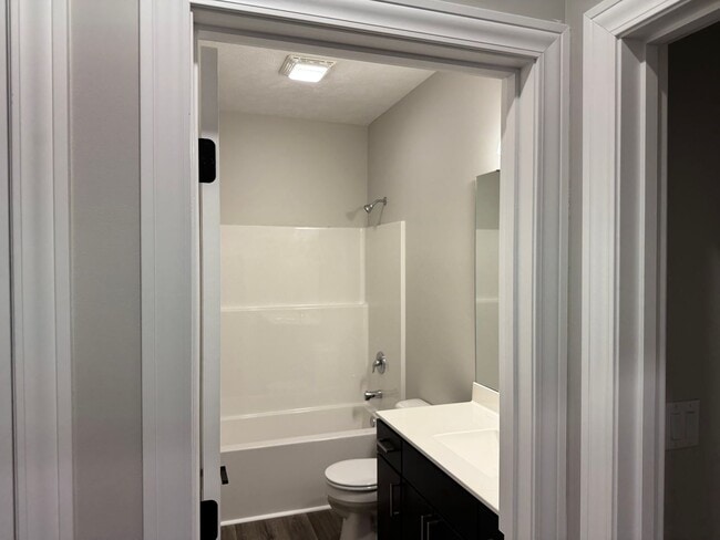 Building Photo - New Construction! West side location. 4br, 3bth, 2crg, Finished basement. All new stainless steel...