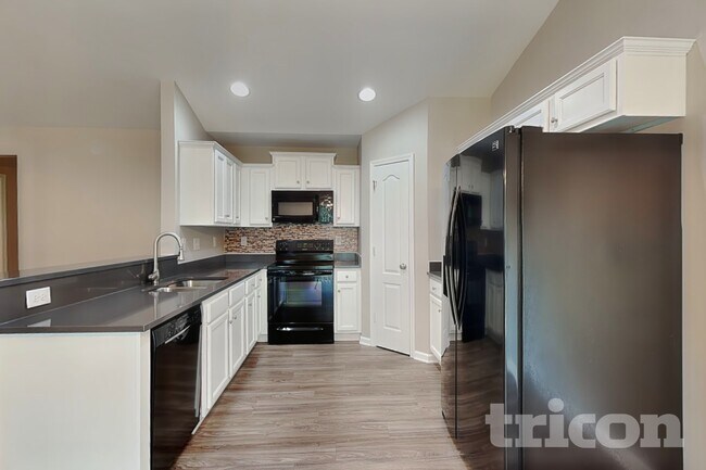 Building Photo - 6235 Leslie Drive