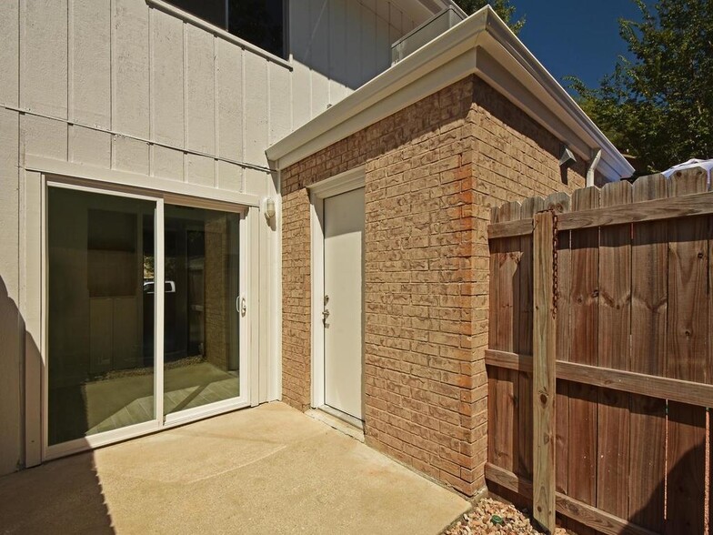 Private patio w/ secured parking behind your fence - 8812 Dawnridge Cir