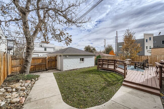 Building Photo - LOCATION, LOCATION! Featuring modern finishes and a peaceful outdoor retreat, this 2-bed 2.5-bath...