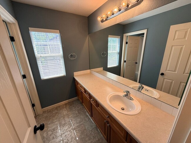 Building Photo - Modern 4-Bedroom Home in Renaissance Neighborhood Near Trails