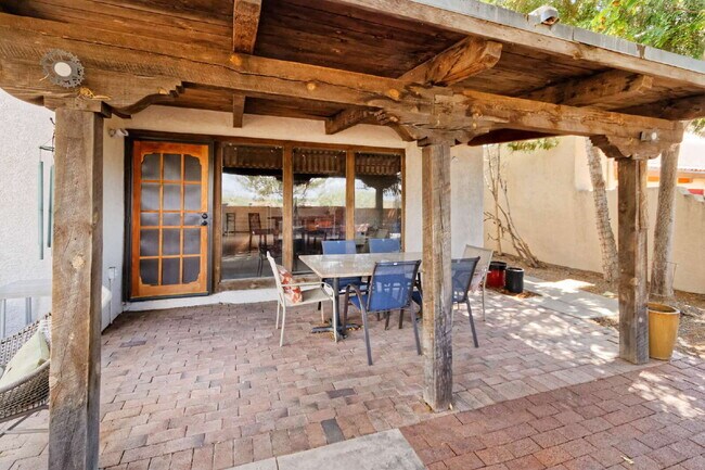 Building Photo - One-of-a-kind adobe brick home backing up ...