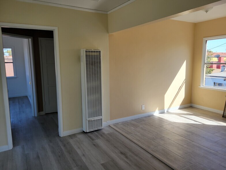 DINING ROOM / HALLWAY TO ROOMS - 2416 Flower St