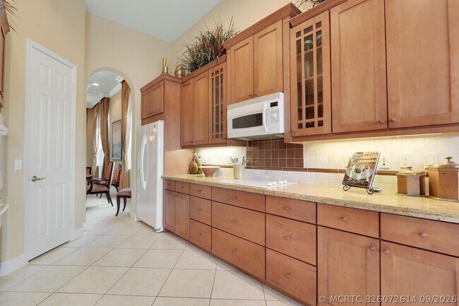 Building Photo - 9885 SW Torriente Ln