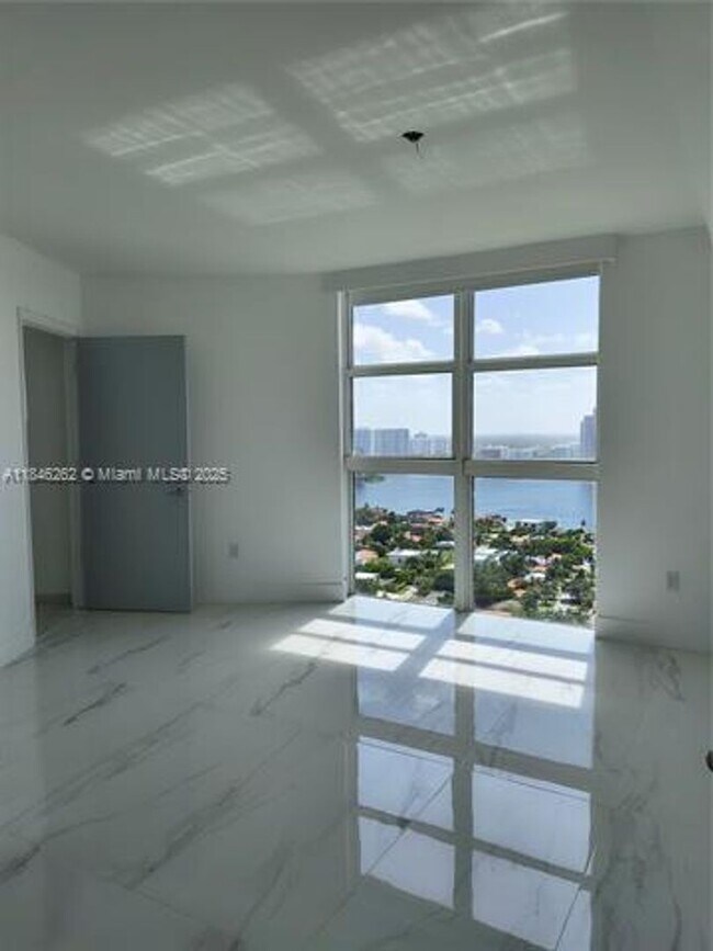 Building Photo - 19111 Collins Ave
