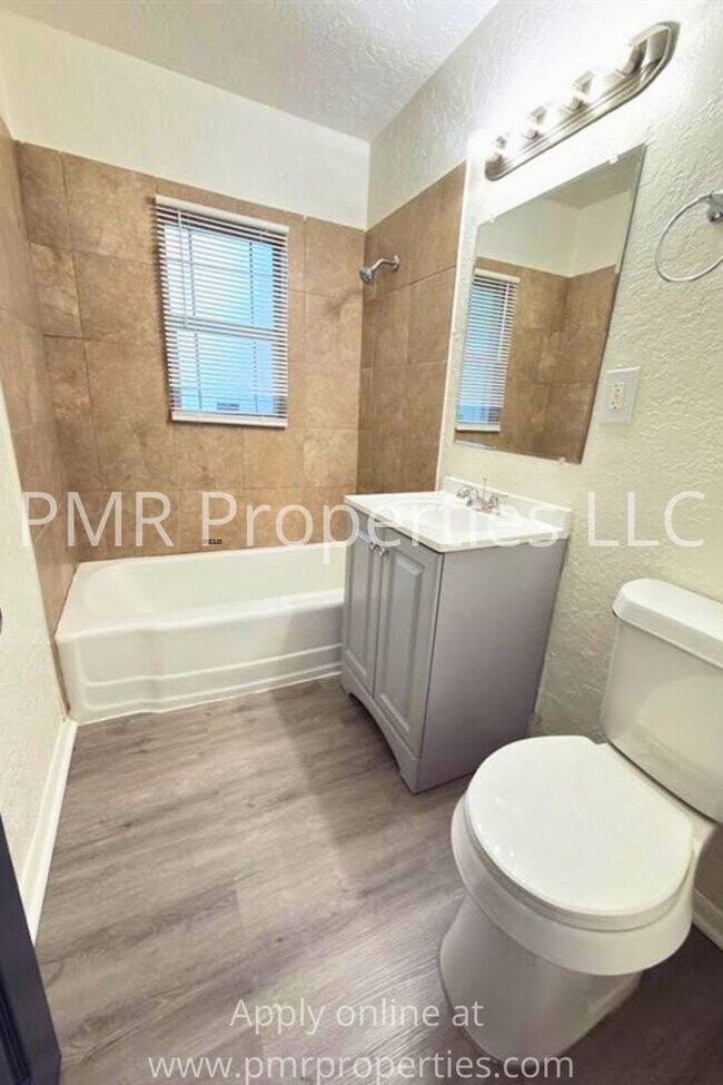 Building Photo - 4 Bedrooms / 2 Bathrooms House