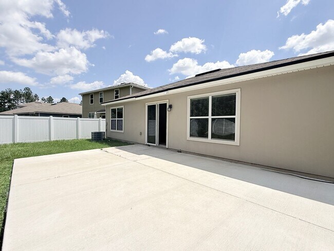 Building Photo - Spacious 4BR Home with Large Fenced Yard & Community Pool