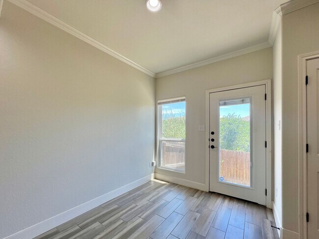 Building Photo - Spacious Townhome with a Private Backyard & No Rear Neighbors!