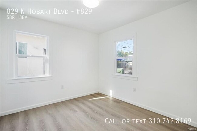 Building Photo - Luxe Living at 825 N. Hobart Blvd. – Where...