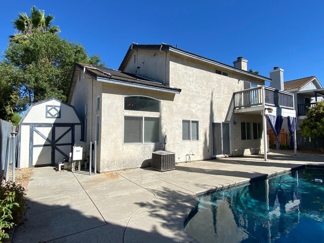 Building Photo - Large Four Bed, Three Bath Home with a Pool