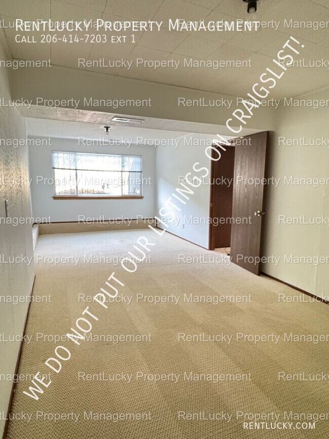 Building Photo - 6718 23rd Ave SW