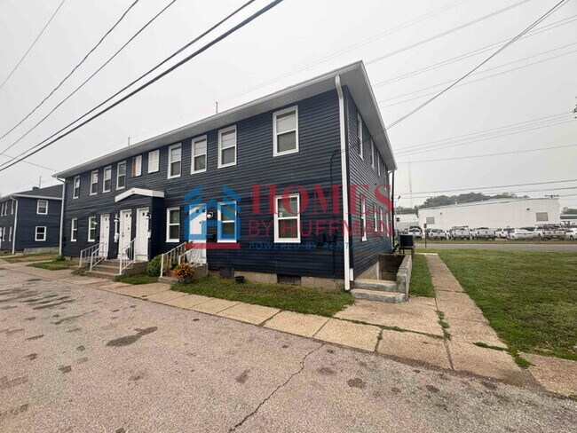 Building Photo - One Bedroom Apartment | Laundry Facility | Utilities Included