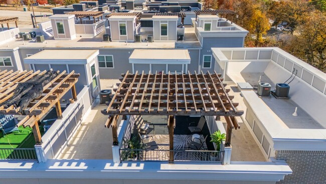 drone view of balcony and complex - 1211 Beaconsfield Ln