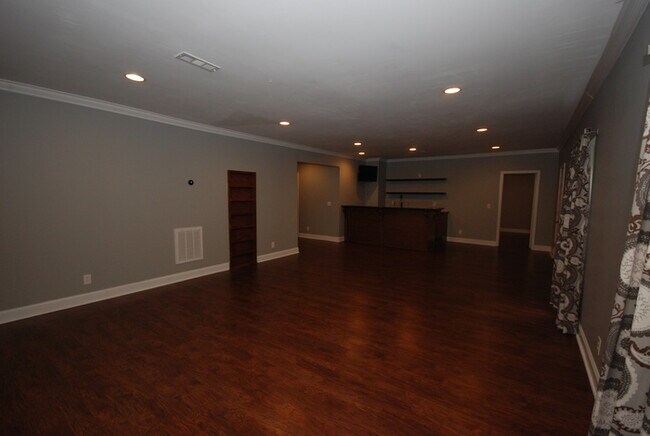 Building Photo - Oversized Executive Style Home with Finish...
