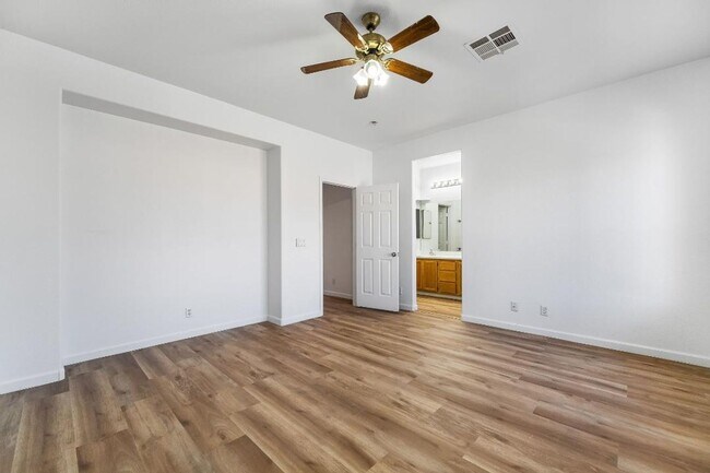 Building Photo - Silverado Ranch: Bright, Open Concept 3/2/2 Home with Downstairs Bedroom & Full Bath, Community Pool