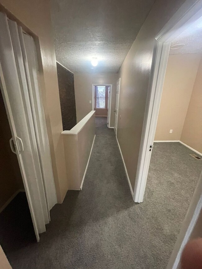 Building Photo - Two Bedrooms W/ Storage Room Upstairs 1 1/...