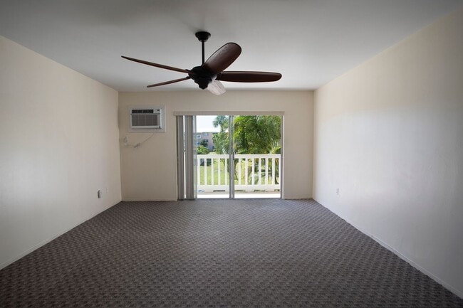 Building Photo - 3 Bedroom 2 Bathroom unfurnished Condo pool view