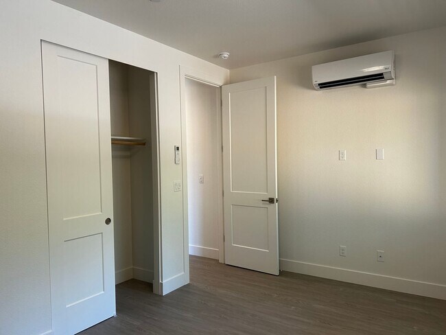 Building Photo - Coming soon! Lower unit  2 bed 1 bath townhome with attached garage