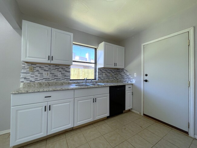 Building Photo - Welcome to this charming two-story single-...