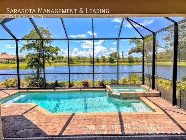 Building Photo - 2 Bed 2 Bath with Den Lake View Pool Home ...