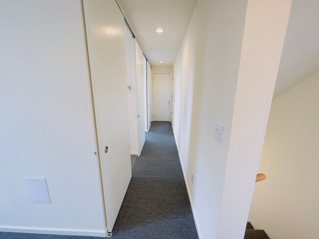 Building Photo - 3 Bedroom Central District Townhome w/ Garage, AC & Rooftop Deck