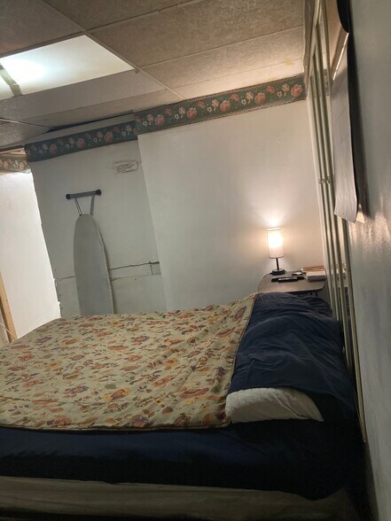 Bedroom with entry to kitchenette - 764 Lenore Ln