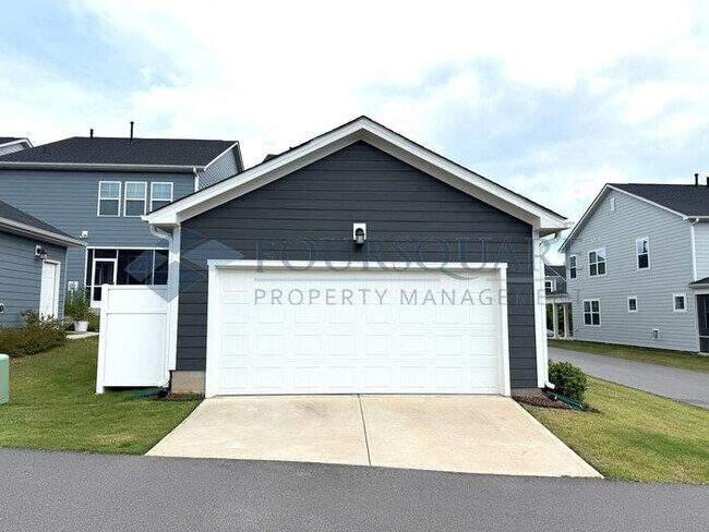 Building Photo - Spacious Corner-Lot Home with Guest Suite, Screened Porch & Detached 2-Car Garage – Resort-Style ...
