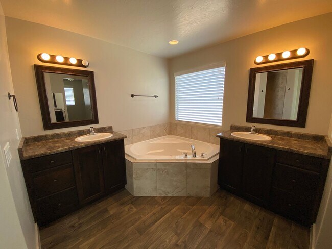 Building Photo - Gorgeous Home with HUGE backyard and play-set.