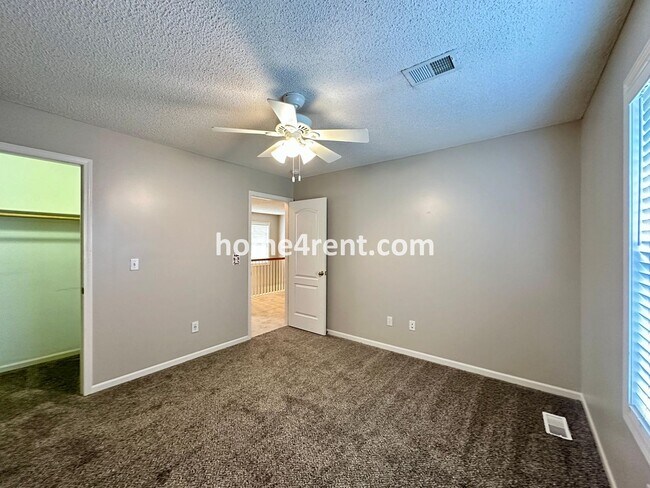 Building Photo - Beautiful Four-Bedroom Home with Three Car...