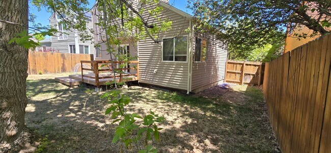 Building Photo - Charming 4-Bed Home in Louisville features bright, open living space, with open deck & garden!