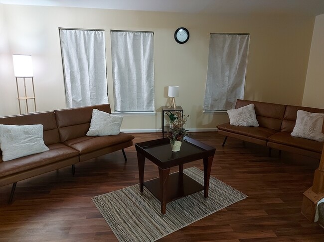 Furnished living room - 7021 Holly Springs Ln