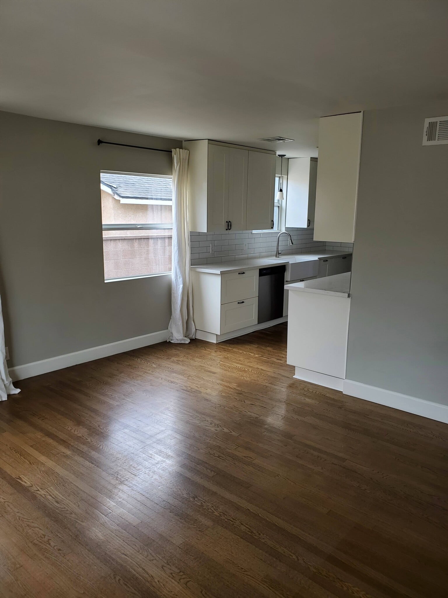 large living room connected to dining area and kitchen - 8608 Harrison Way